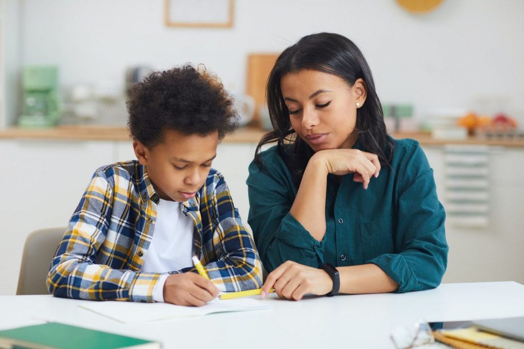 Teenage African Boy in Homeschooling