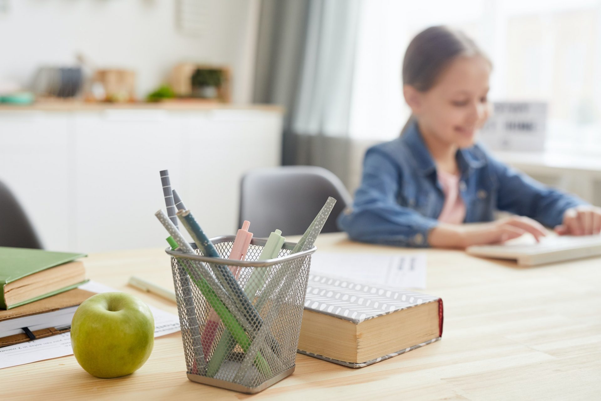 Background Image of Girl Studying at Home